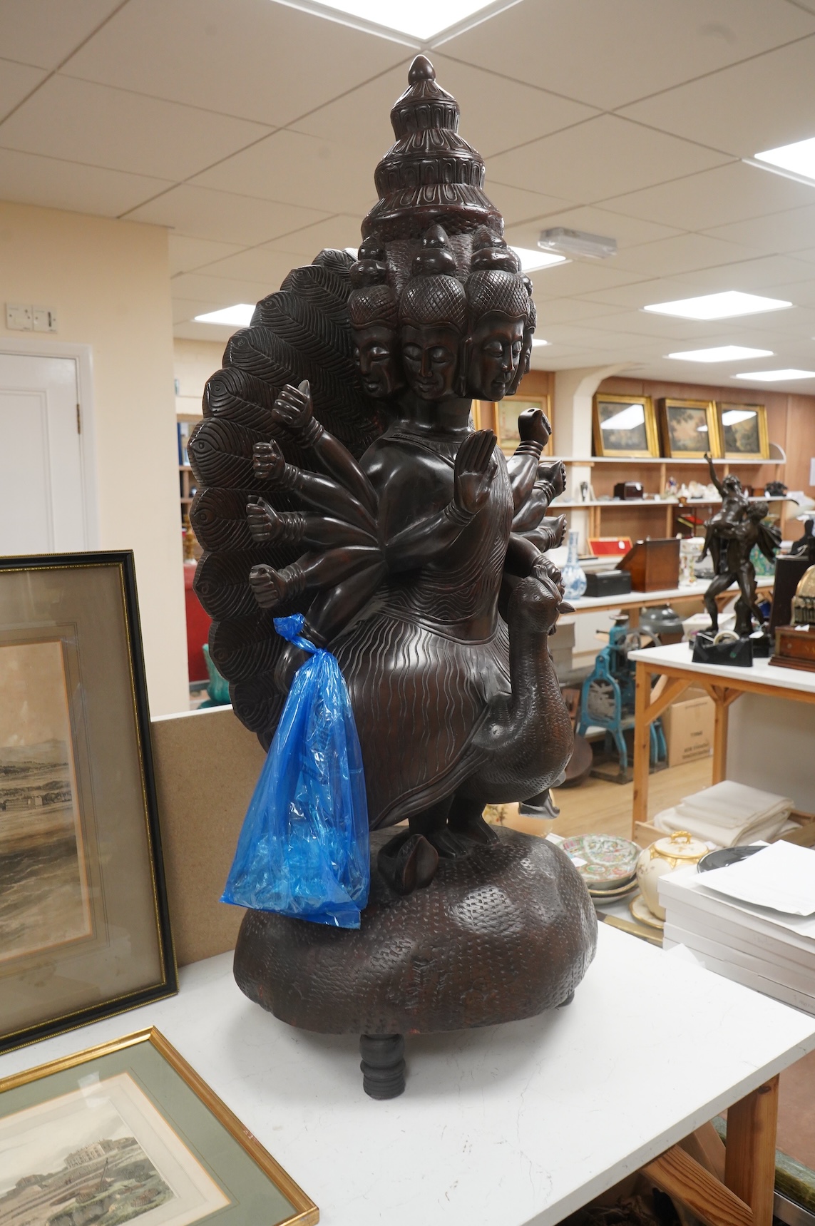 A large carved Ceylonese “Hindu Buddha” 108cm high